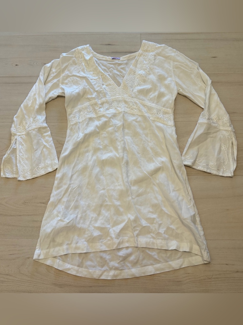 Calypso White V-Neck Mini Dress with Bell Sleeves